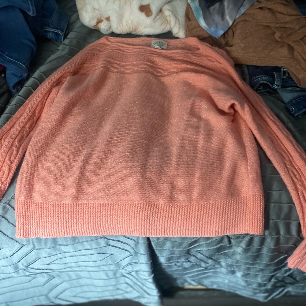 A orange sweater